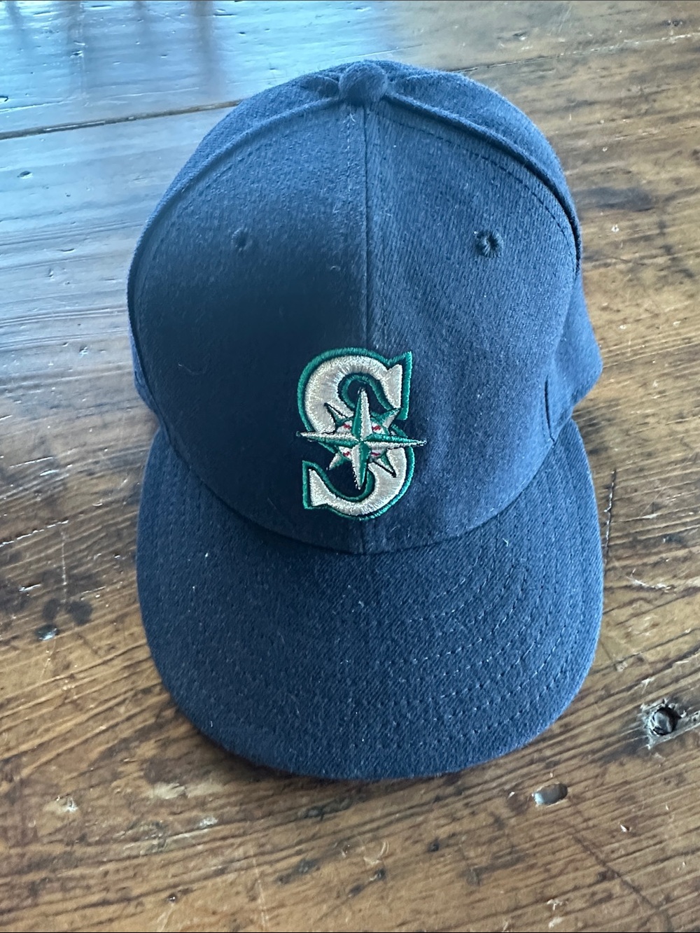 New Era Mariners Navy Blue Snapback with Teal & Silver Logo